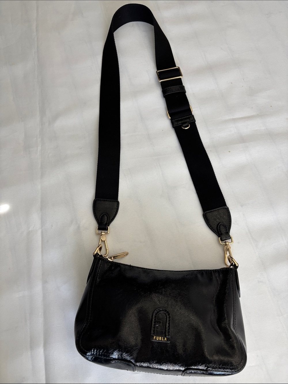 Furla Atena crossbody bag patent leather Arch logo webbed shoulder strap